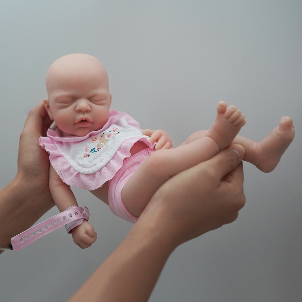 Bebê Reborn Boneca Silicone Sólido Realista 35cm Brastoy - Imagem 7